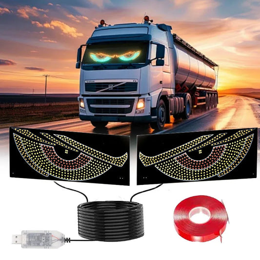 Demon eye LED lights glowing on a truck windscreen, with USB lead and mounting tape