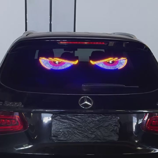 Blue demon eye LED lights running on a car rear windscreen, showing the flashing modes and the USB button control
