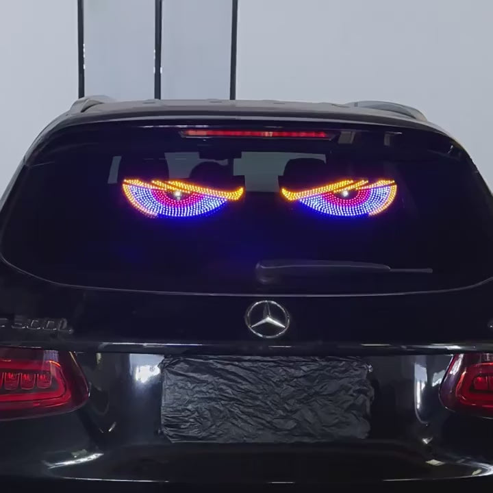 Blue demon eye LED lights running on a car rear windscreen, showing the flashing modes and the USB button control