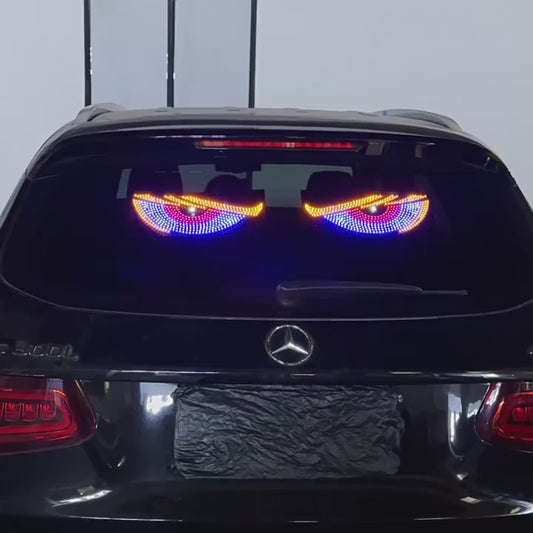 Blue demon eye LED lights running on a car rear windscreen, showing the flashing modes and the USB button control